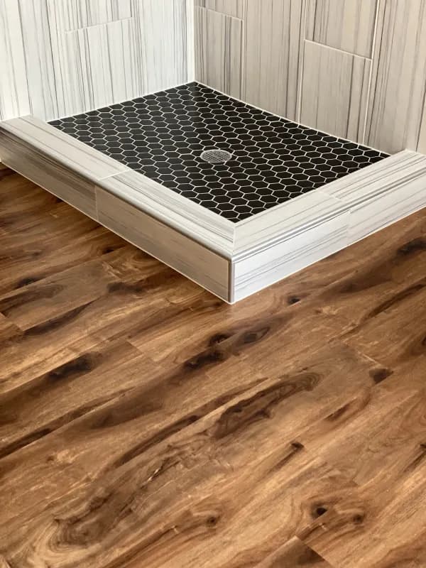 bathroom and shower remodel by At Home Flooring Solutions in McKinney, TX