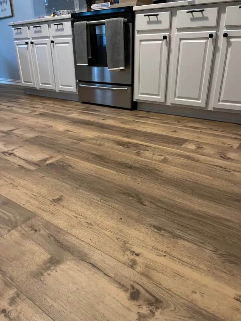 waterproof vinyl flooring installation by At Home Flooring Solutions in Rockwall, TX